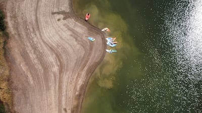 A drone view shows water levels recede at Ardingly Reservoir after Britain’s Environment Agency declared the East Midlands, Lincolnshire, Northamptonshire, Kent, East Sussex, Solent and South Downs regions in drought during the fifth heatwave of the year, near Ardingly, south‑east Britain, August 12, 2026. REUTERS / Carlos Jasso TPX IMAGES OF THE DAY