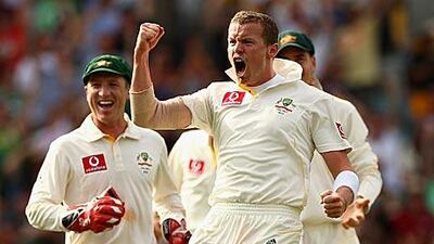 Peter Siddle, of Australia, celebrates after claiming the wicket of England’s Matt Prior on day one of the first Ashes Test at The Gabba yesterday. Siddle was so pumped, he went on take a hat-trick thereafter.
