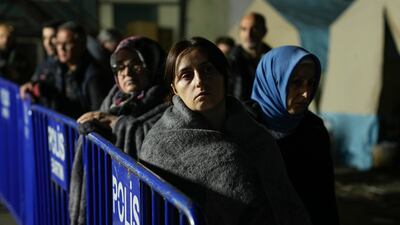 Relatives of missing miners gather at a mine in Amasra, in the Black Sea coastal province of Bartin, Turkey, after an explosion on Friday when dozens were trapped. The death toll has been put at as high as 40. AP