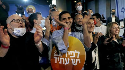 Supporters cheer during a Yesh Atid party event in Tel Aviv, Israel. Bloomberg