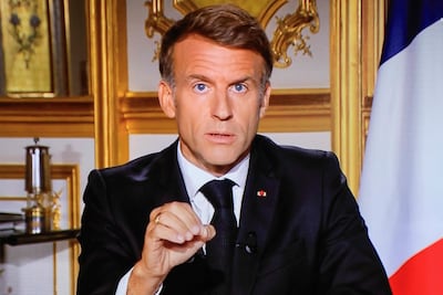 Emmanuel Macron flew to Kuwait only hours after delivering a televised address to the French nation. AFP