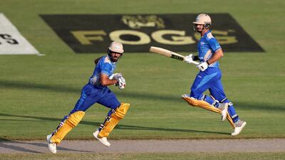 Sharjah, United Arab Emirates - October 17, 2018: Ravi Bopara and Ryan ten Doeschate(R) of the Balkh Legends bats during the game between Balkh Legends and Nangarhar Leopards in the Afghanistan Premier League. Wednesday, October 17th, 2018 at Sharjah Cricket Stadium, Sharjah. Chris Whiteoak / The National