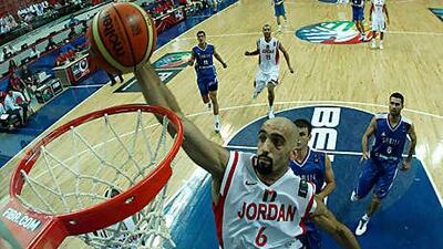 Jordan's Zaid Abbaas dunks against Serbia during their World Championship clash yesterday.
