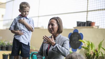 Samantha Steed, the principal of Ranches Primary School, performs mindfulness exercises with her students. Mona Al Marzooqi / The National / February 22, 2017