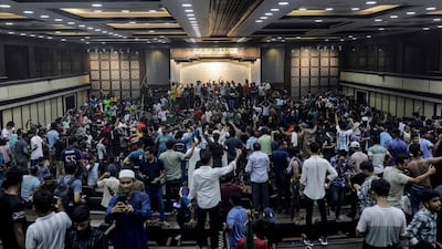 Protests that began as student-led demonstrations against government hiring rules in July culminated on August 5, with the army taking over. AFP