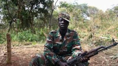 A Lord's Resistance Army soldier poses during peace talks between his commanders ans Ugandan religious and cultural leaders in southern Sudan.