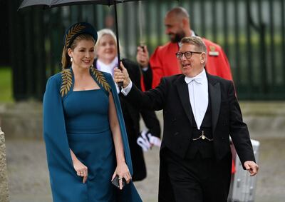 Ms Mordaunt had her teal outfit custom-made for the coronation. EPA