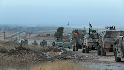 Kurdish peshmerga forces begin their advance towards the ISIL-held town of Bashiqa near the village of Narawan in northern Iraq on October 20, 2016. Florian Neuhof for The National
