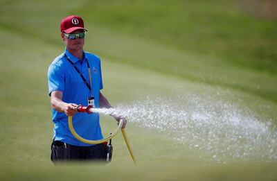 Groundstaff work on the Royal Portrush course during practice on Tuesday. Reuters
