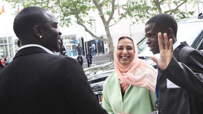 Zayed Future Energy Prize winner Dikirani Thaulo, right, meets rapper Akon at the SE4All event. Courtesy Zayed Future Energy Prize