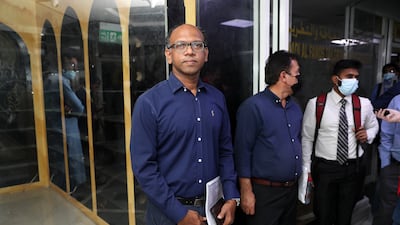 Mahfuzur Rahaman Khan, from Bangladesh, in the queue of applicants. In recent months, demand for taxis has outstripped supply in Dubai.