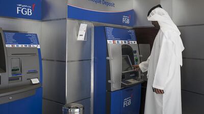 The merger of the two Abu Dhabi listed banks would create a lender with $175 billion in assets, the largest in the Middle East. Mona Al Marzooqi / The National