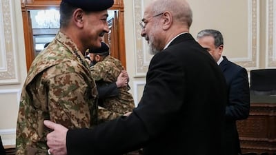 Iranian parliamentary Speaker Mohammad Bagher Ghalibaf, right, greets Pakistan's army chief Asim Munir. EPA