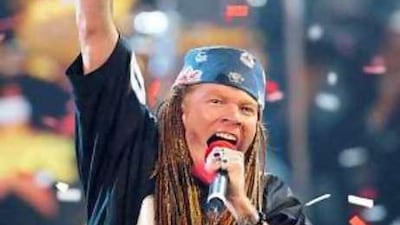 In a rare step back into the limelight during his 15-year old self-imposed exile, Axl Rose performs at the 2002 MTV Video Music Awards in New York.