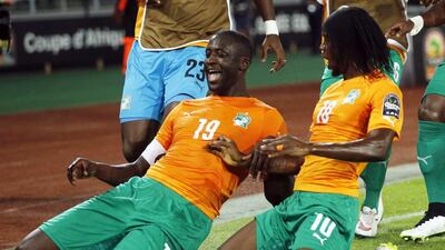 Ivory Coast’s Yaya Toure (L) celebrates his goal with teammate Kouassi Gervais during their semi-final soccer match of the 2015 African Cup of Nations against Democratic Republic of Congo in Bata, February 4, 2015. REUTERS/Amr Abdallah Dalsh