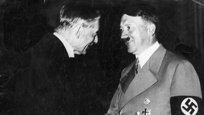 British prime minister Neville Chamberlain meets German fuhrer Adolf Hitler in 1938 to discuss a non-aggression pact. New York Times Co. / Getty Images