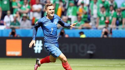 Antoine Griezmann celebrates scoring the equalising goal. Valery Hache / AFP