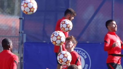 Atletico forward Antoine Griezmann, centre, at training. EPA