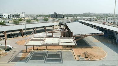 Solar panels above the car park at Masdar City's net-zero building in Abu Dhabi. Khushnum Bhandari / The National