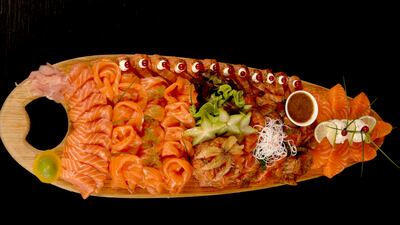 The Royal Degustation platter with six salmon variations: classic smoked, marinated, beetroot gravadlax, tartar, julienne and heart of oak smoked. Courtesy Salmontini