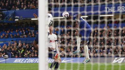 Trevoh Chalobah of Chelsea scores his team's first goal with a header whilst under pressure from Emerson Royal of Tottenham Hotspur. Getty