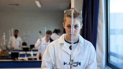 Chloe Muller, 17, a student at Lycee Louis Massignon, works on an experiment during the qualifying examination yesterday for a worldwide chemistry competition for French-language schools.