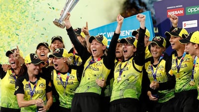 Australia celebrate after beating India in the women's T20 World Cup final at the Melbourne Cricket Ground on Sunday. Getty