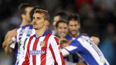 Atletico Madrid are four points off Real Madrid's La Liga leading pace after losing to Real Sociedad on Sunday. Juan Herrero / EPA / November 9, 2014