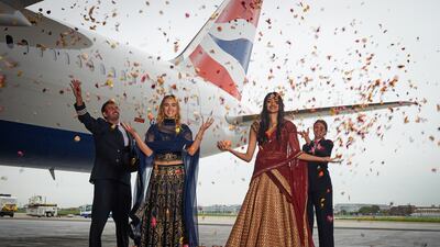 Suki Waterhouse and Neelam Gill with pilots Suneil Banerjee and Caitlin Emery to mark the launch of flights by the new British Airways Boeing 787-9 Dreamliner from London to New Dehli at Heathrow Airport in 2015