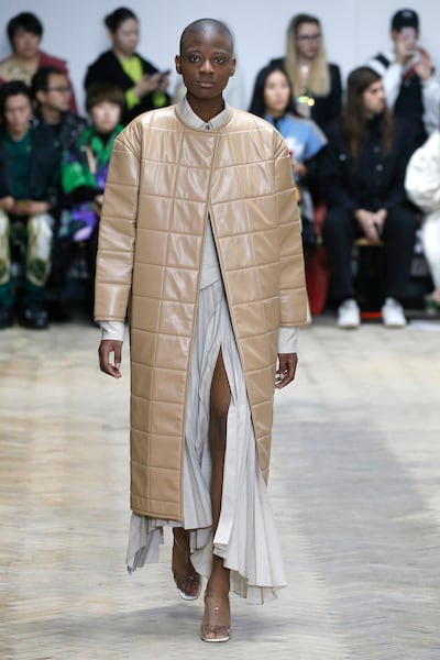 A model walks the runway at the A.W.A.K.E.show during London Fashion Week. Getty
