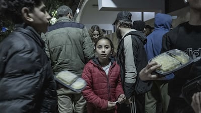 Activists distribute food to families displaced by Israeli attacks in Beirut. Getty Images
