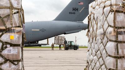 Crew members unload Nestle baby formula in Indianapolis, US, after its arrival from Ramstein Air Base in Germany. Reuters