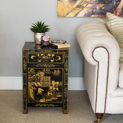 Add interest to a stark look with a touch of the East, such as this Chinoiserie side cabinet. Photo: Orchid Furniture