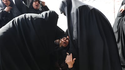 Iranians mourn during funeral ceremonies for victims of the Israel-US war. EPA.