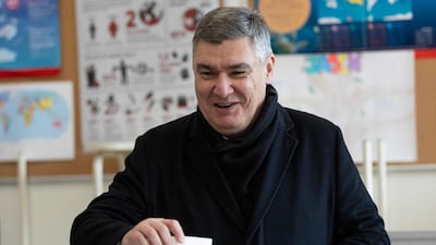Mr Milanovic casts his ballot at a polling station in Zagreb. AFP