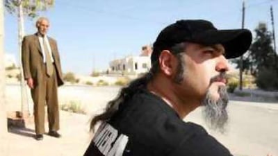 Muhanned Jaradat, right, 32, is unmarried and lives with his father. Jamal Jaradat, left, has difficulty relating to his son.