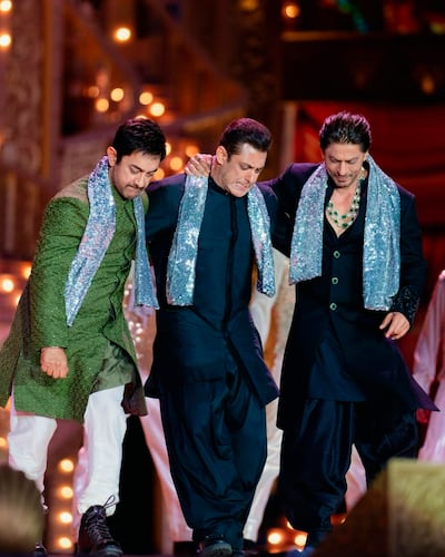 Bollywood stars Aamir Khan, Salman Khan and Shah Rukh Khan performing at the pre-wedding bash. Reliance group via AP