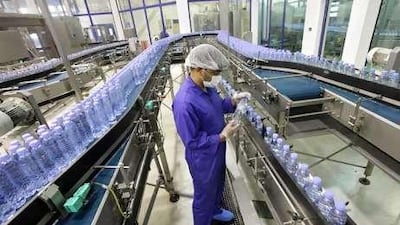 Rhapsody in blue: the process goes from pumping, bottom right, to packaging, above. The rock through which the water travels can be found only in the UAE and New Zealand.