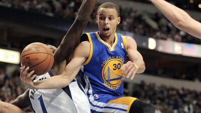 Stephen Curry is averaging 24.1 points per game for Golden State this season. Matt Strasen / AP