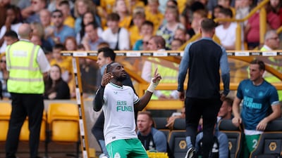 Allan Saint-Maximin celebrates after scoring for Newcastle. Getty