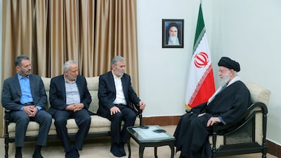 Iran's supreme leader Ayatollah Ali Khamenei, right, with Palestinian Islamic Jihad leader Ziad Al Nakhaleh, second right, in Tehran. AP