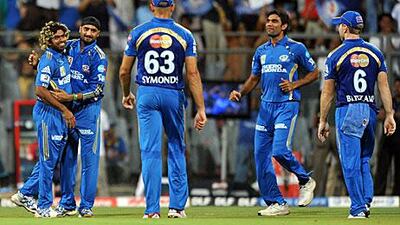 Mumbai Indians players celebrate their entry into the semi-finals of the IPL.