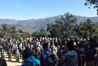 Hundreds of people travelled to Rayan's village to pay their respects. Reuters