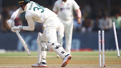 Todd Murphy of Australia is bowled by India's Umesh Yadav for a duck. Getty