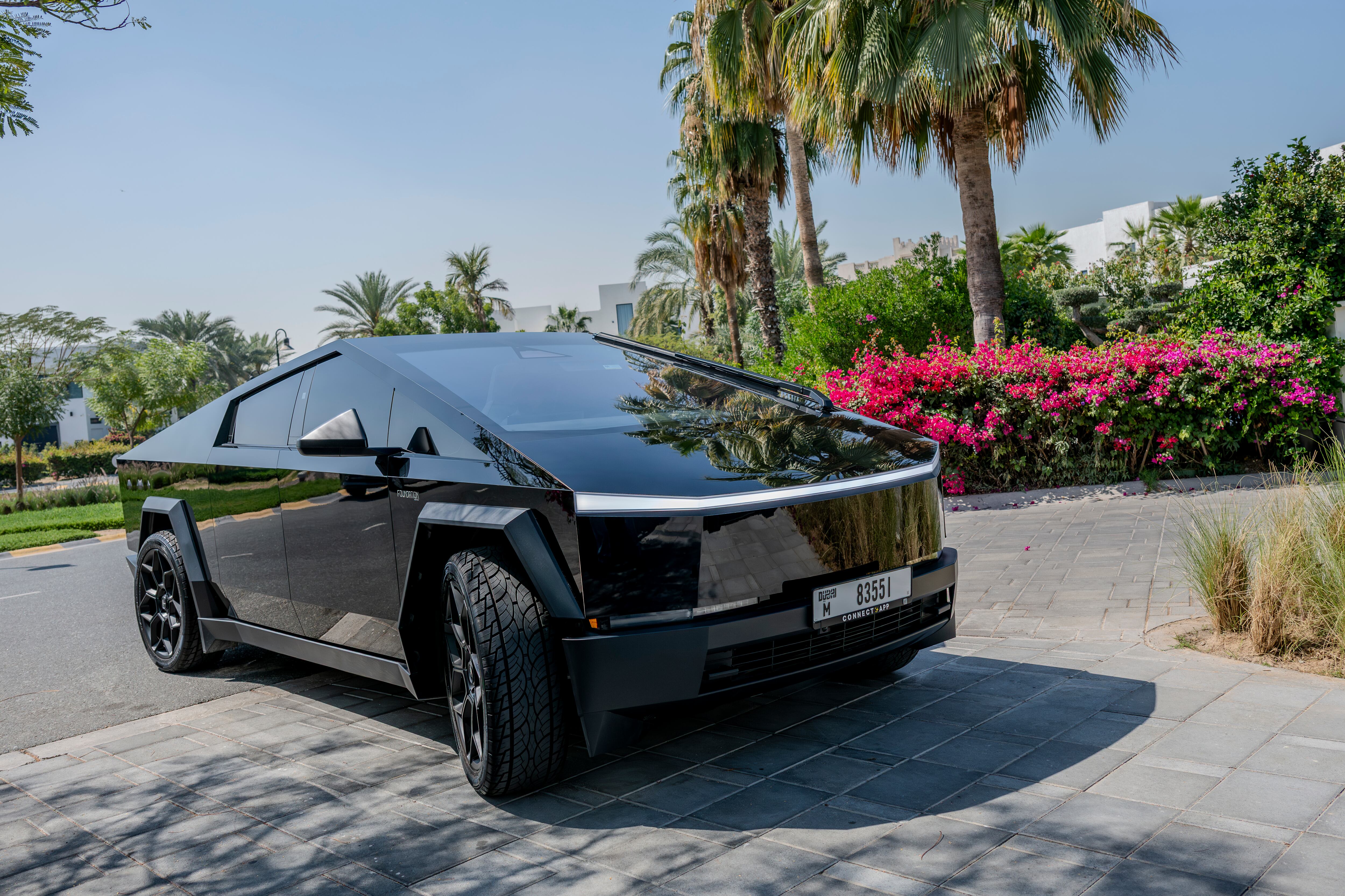 Dubai Ride Cybertuck 'Unnerving but safe': Behind the wheel of a self-driving Cybertruck on ...