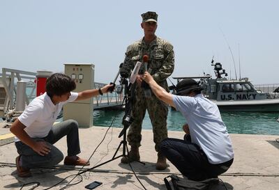 Cmdr Sean Kido of the US Navy's 5th Fleet speaks to journalists at a base near Fujairah. AP