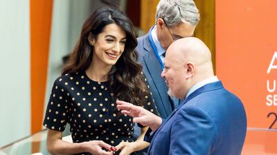 Human rights lawyer Amal Clooney talks with ICC lead prosecutor Karim Khan in New York in 2022. EPA-EFE