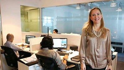 Lama Ataya, the chief marketing officer at Bayt.com, tries to keep employees at the top of their game with a variety of incentives. Pawan Singh / The National