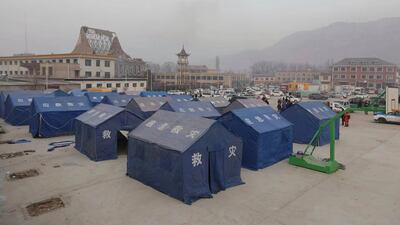 Tents are set up for survivors of the quake in Dahejia village, in Jishishan county. AP