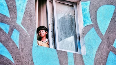 Pictured is a work in Ajman by French-Tunisian artist el Seed - who will start on his first work in Abu Dhabi (near Abu Dhabi Mall) this weekend. The piece will be a collaboration between the artist and children in the emirate.